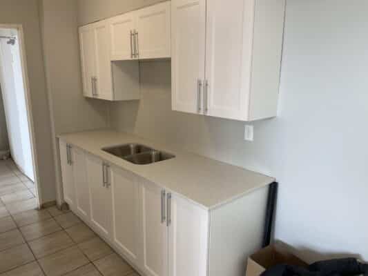 kitchen with countertops and custom cabinets